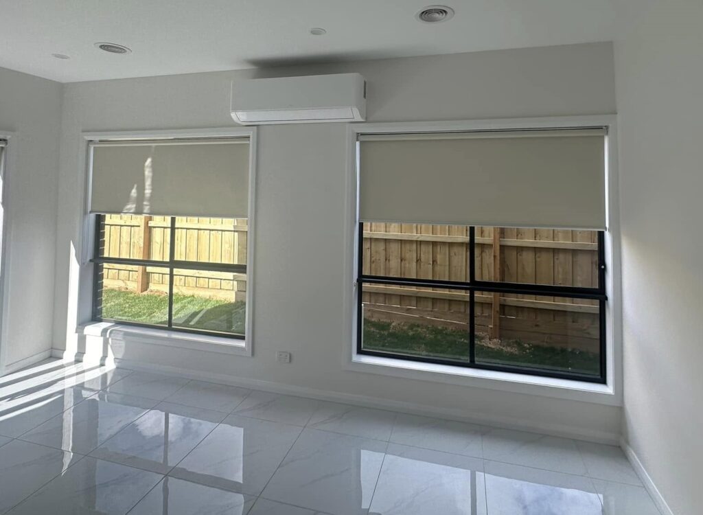 Affordable roller blinds fitted to windows in a bright, modern home of Dandenong.